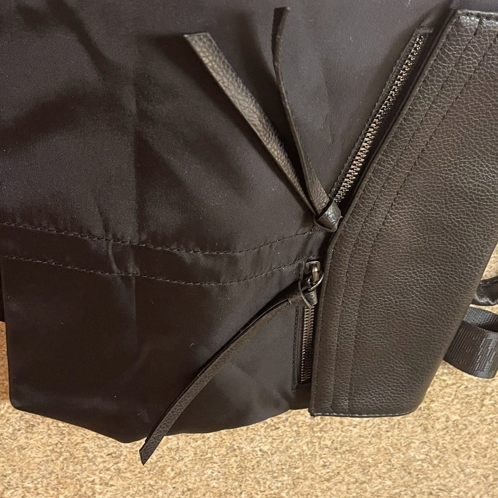 A black botkier back pack